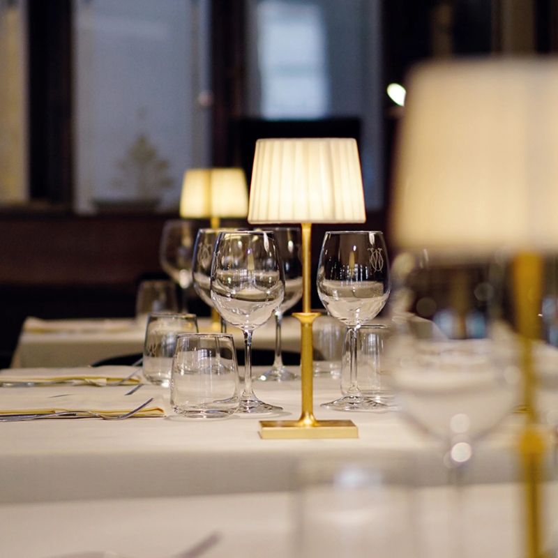 The matte gold Polinda Classic from Zafferano in a commercial cafe space.