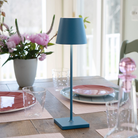 The avio blue Poldina Pro from Zafferano in a dining space.