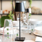 The black Poldina Pro from Zafferano in  dining setting.