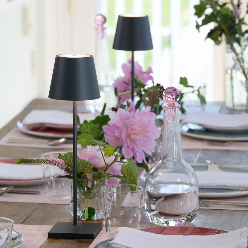 The dark gray Poldina Pro from Zafferano on a dining table.