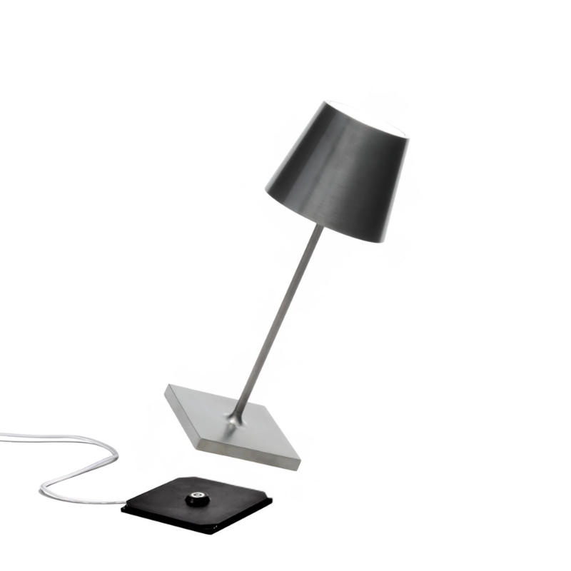 The antique nickel Poldina Pro Mini from Zafferano, a cordless lamp.