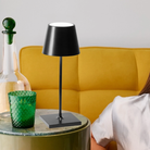 The black Poldina Pro Mini from Zafferano in a lounge.