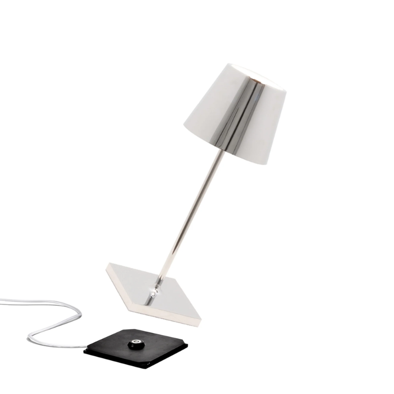 The glossy chrome Poldina Pro Mini from Zafferano, a cordless lamp.