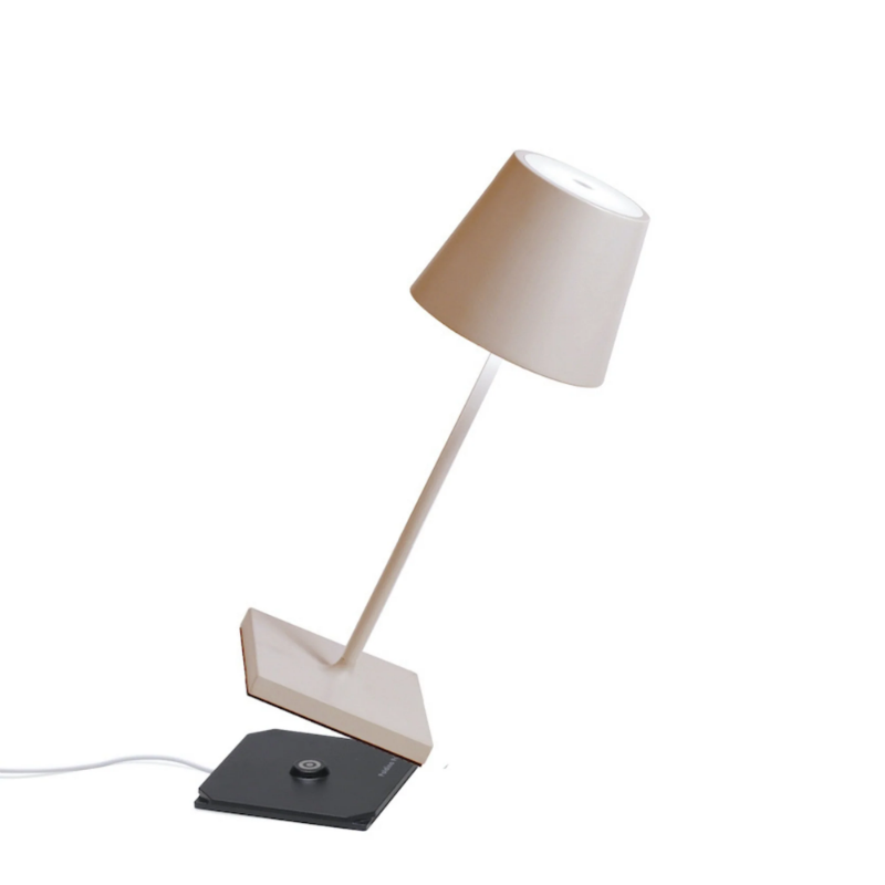 The sand Poldina Pro Mini from Zafferano, a cordless lamp.