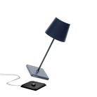The steel blue Poldina Pro Mini from Zafferano, a cordless lamp.