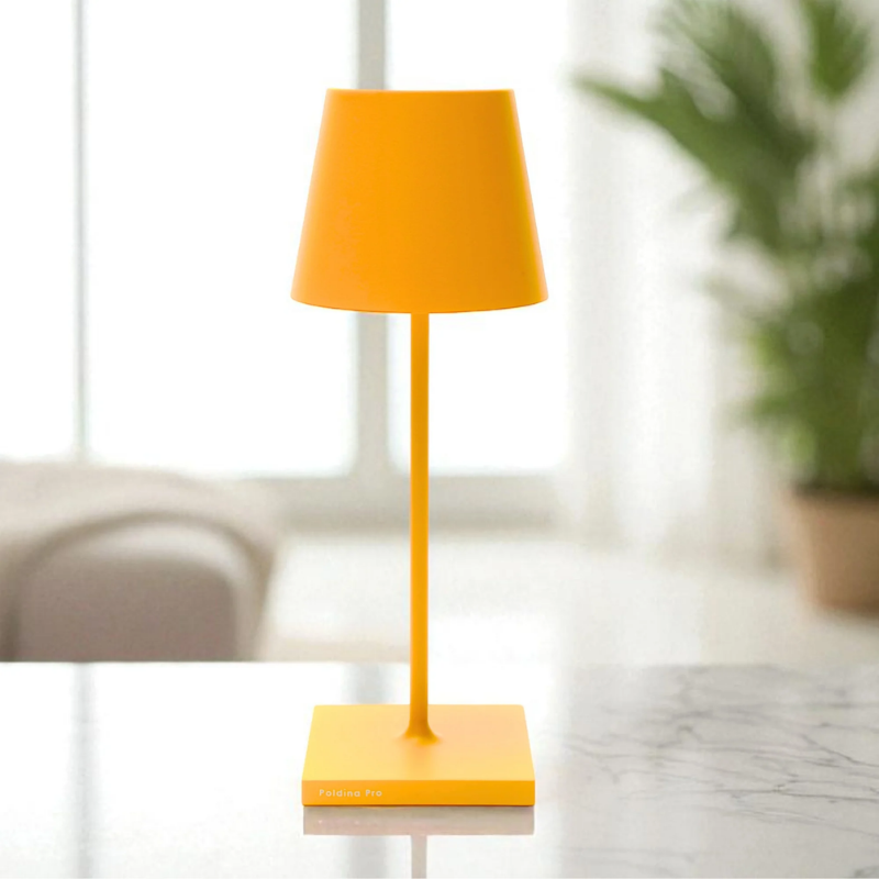 The sunflower Poldina Pro Mini from Zafferano on a countertop.