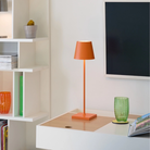 The orange Poldina Pro from Zafferano in a lounge.