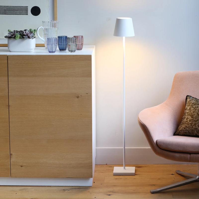 The white Poldina Pro L Floor Lamp from Zafferano in a kid's room.