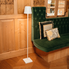 The white Poldina Pro L Floor Lamp from Zafferano in a living space.