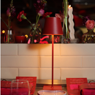 The red Poldina Pro from Zafferano in a living space.