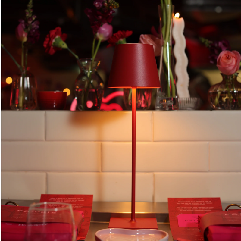 The red Poldina Pro from Zafferano in a living space.