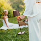 The rust Poldina Pro from Zafferano in a garden.