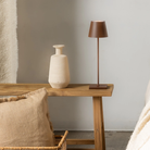 The rust Poldina Pro from Zafferano in a guest bedroom.