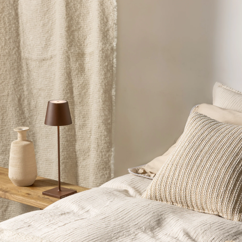 The rust Poldina Pro from Zafferano in a secondary bedroom.