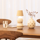 The sand Poldina Pro Stopper from Zafferano in a living room.