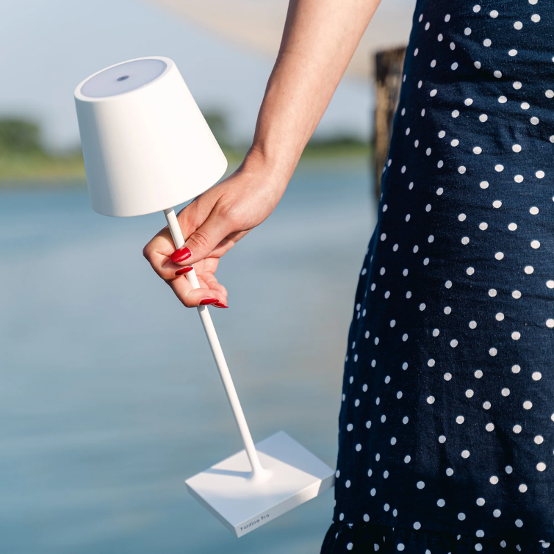 The white Poldina Pro from Zafferano, a portable lamp.