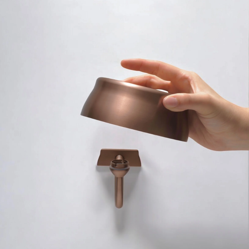 The anodized copper Sister Light Wi-Fi Wall Lamp from Zafferano is wall-mounted.