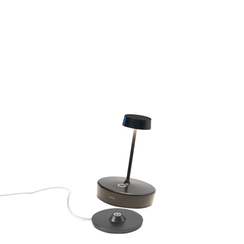 The black Swap Pro Mini from Zafferano, a cordless lamp.