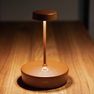 The rust Swap Pro Mini from Zafferano in a living space.