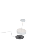 The white Swap Pro Mini from Zafferano, a portable lamp.