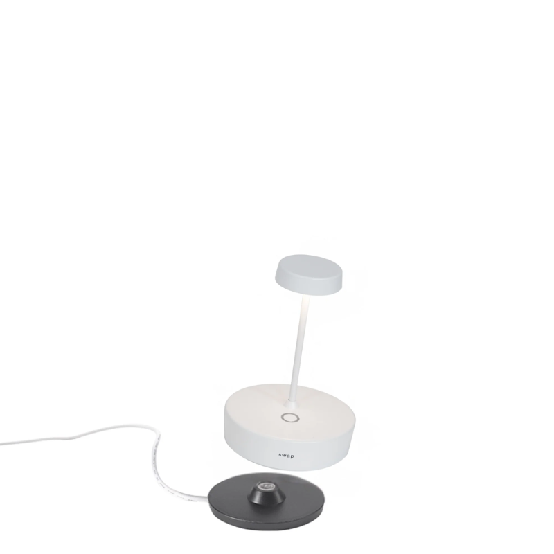 The white Swap Pro Mini from Zafferano, a portable lamp.
