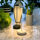 The white and black Swap Pro from Zafferano on a dining table. all-group