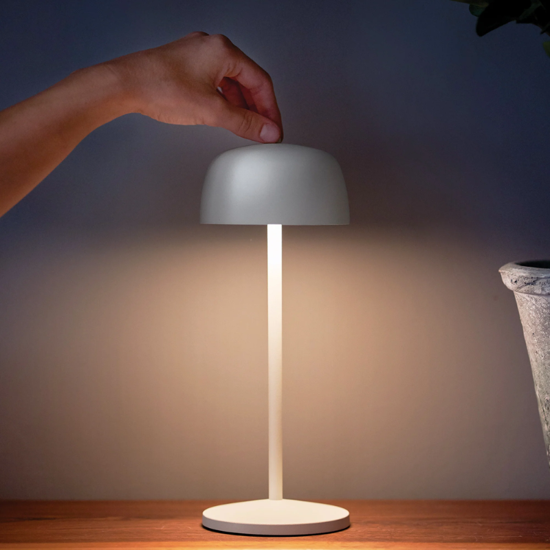 The matte white Theta Pro from Zafferano in a living space.