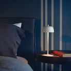 The matte white Theta Pro from Zafferano in a primary bedroom.