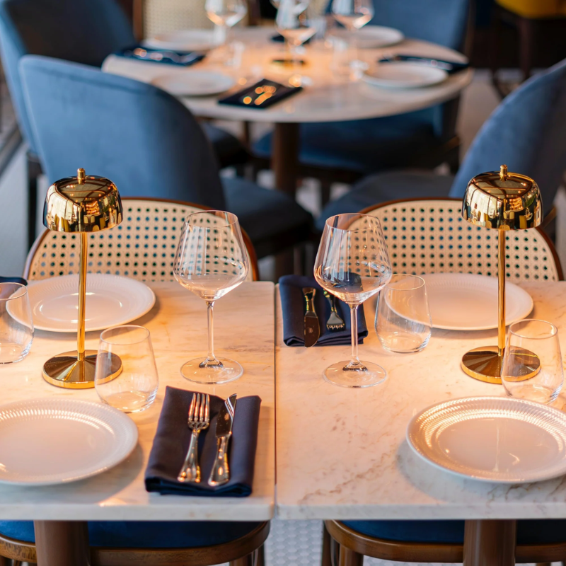 The polished gold Theta Pro from Zafferano in a restaurant.