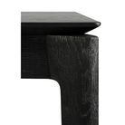 The Bok Dining Table from Ethnicraft in black oak, close-up.