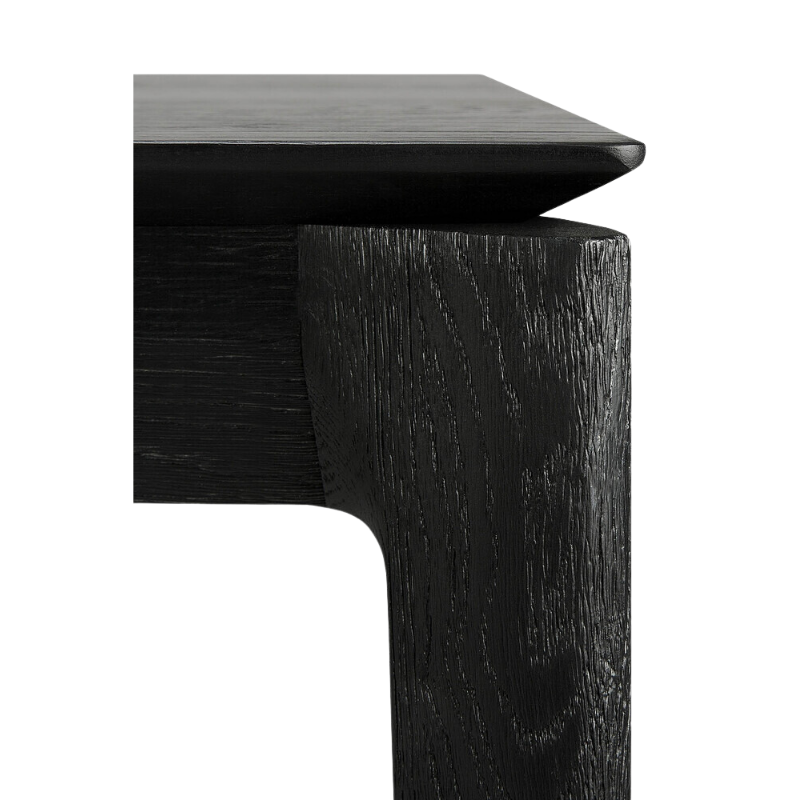 The Bok Dining Table from Ethnicraft in black oak, close-up.
