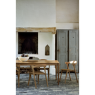 The Bok Dining Table from Ethnicraft outdoors.