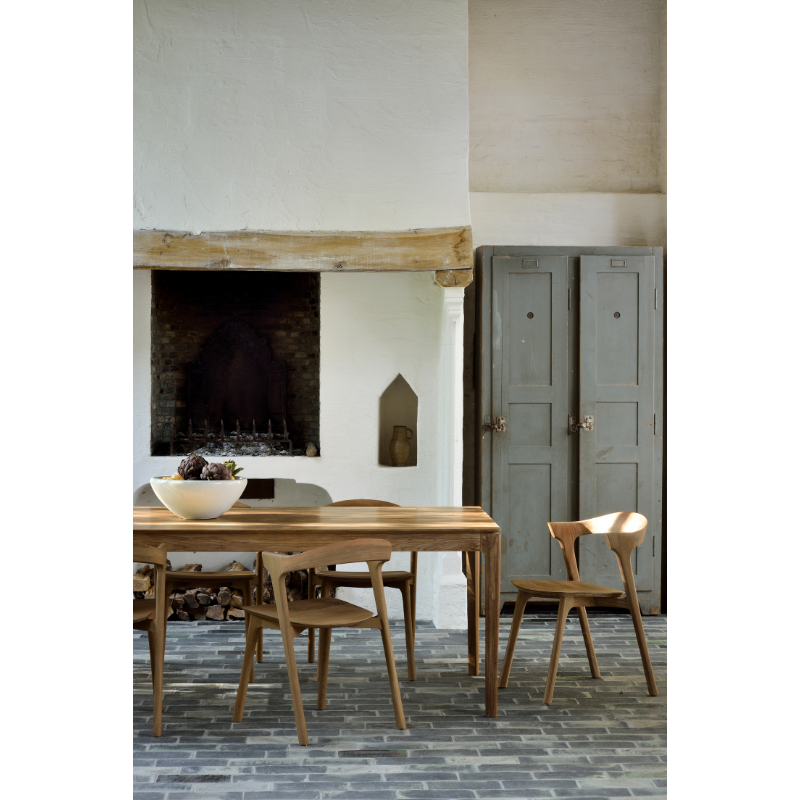 The Bok Dining Table from Ethnicraft outdoors.