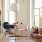 The Eames Dining Table from Herman Miller, designed by Herman Miller x Hay indoors inside of a dining room.