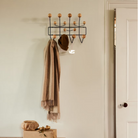 The Eames Hang-It-All from Herman Miller in an entryway.
