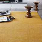 The Eames Turned Stool from Herman Miller used as decor.