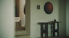 The Flow Console from Ethnicraft in a video living space.