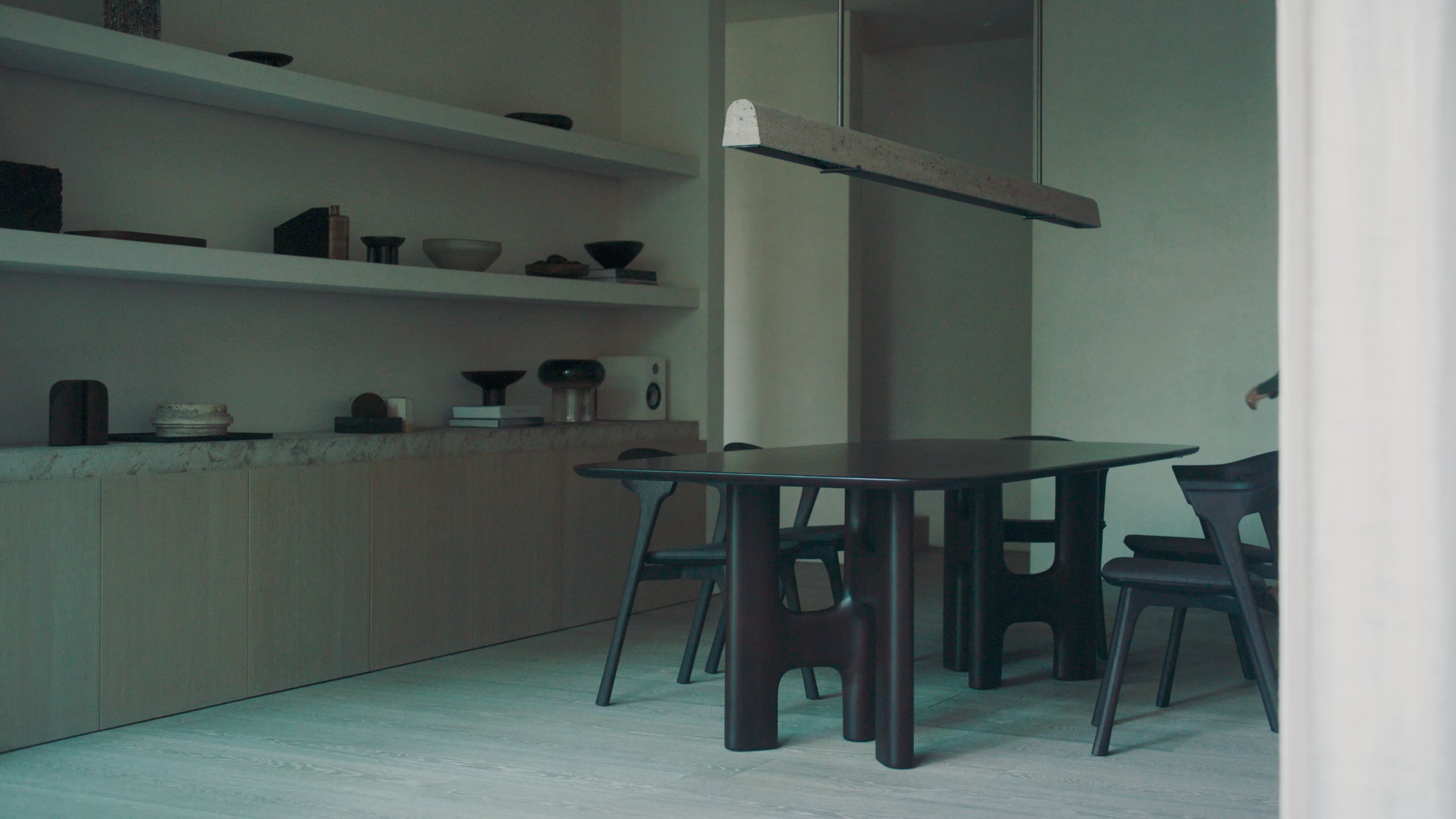 The Flow Dining Table from Ethnicraft in a dining room, shown on video. all-groups