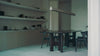 The Flow Dining Table from Ethnicraft in a dining room, shown on video. all-groups
