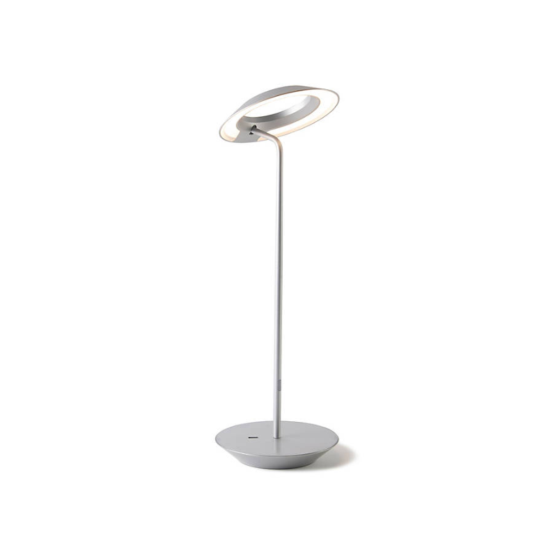 A simultaneously retro and modern desk lamp that combines elegance and inviting warmth. The Royyo Desk Lamp by Koncept will bring whimsy and charm to your desk, as well as super useful and energy-efficient LED illumination. Inventive simplicity is the value that holds together each piece of the desk lamp’s aesthetic, with a somewhat conical shade held at a distinct angle by a thin Aluminum stem. This is contrasted neatly by a distinctively shaped base.