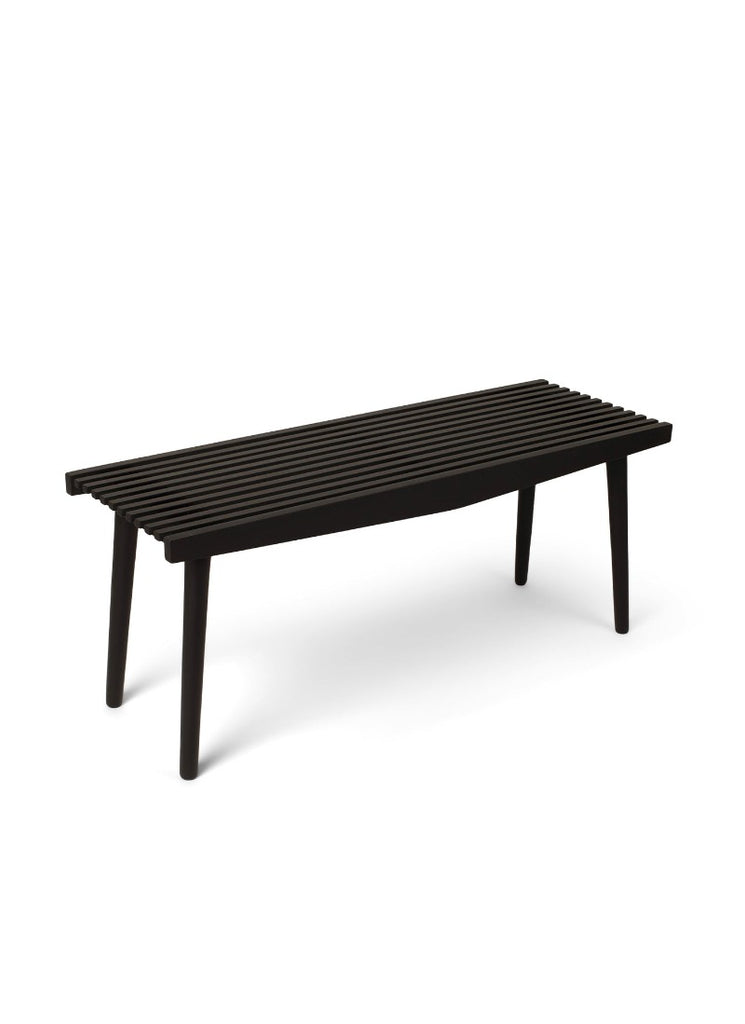 The Uno Ora bench features lovely wooden slats give that produce a light and elegant look with a nicely rounded finish thanks to the conical legs.The Uno Ora bench features lovely wooden slats give that produce a light and elegant look with a nicely rounded finish thanks to the conical legs.