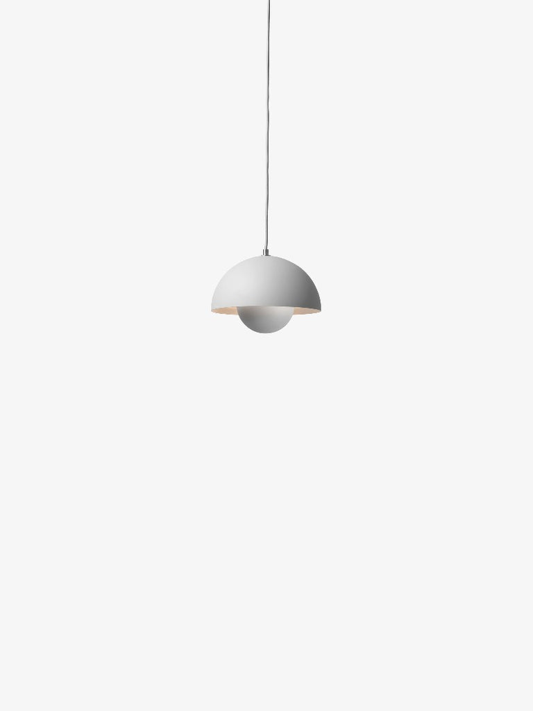 The Flowerpot VP1 Mini Pendant Light by Verner Panton became synonymous with the Flower Power movement from the late 60s. Reflecting a break from convention to embrace a more open, modern mentality that promoted peace and harmony. Such was the mindset of its designer, Verner Panton. One of the most forward-thinking talents of his time. The Flowerpot series consists of several different models, including three pendants and two table lamps - all in a wide range of colors.
