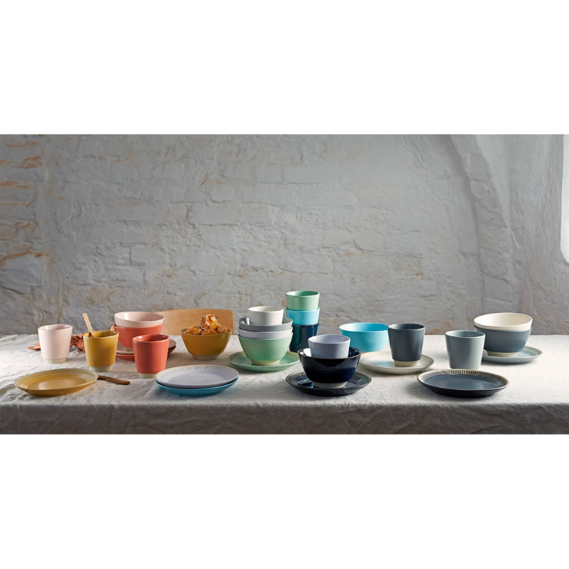 The Colorit range is a colorful ‘sister’ to the classic Knabstrup Keramik tableware of the 1960s. The mugs in the range feature a simple, stylish design with a ribbed base and come in different, exquisite glazes and colors, which look great together when you mix and match them. Mugs are stackable for easy storage.