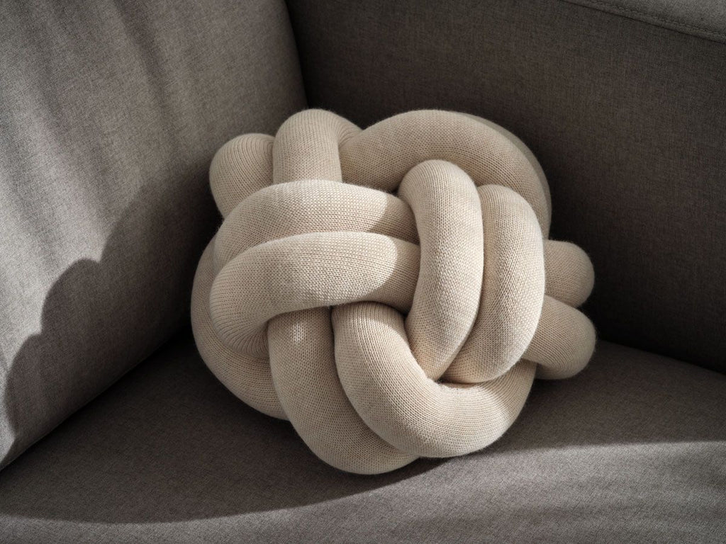 A cushion with a unique character, based on sculptural form instead of patterns. Knot is made from a knitted tube, several meters in length, which is then tied up to create a compact knot which is as comfortable as a support in the sofa as it is elegant to behold. Thanks to its strong design, Ragnheiður Ösp Sigurðardóttir’s Knot cushion belongs to the exclusive group of products that remain in one’s memory. 