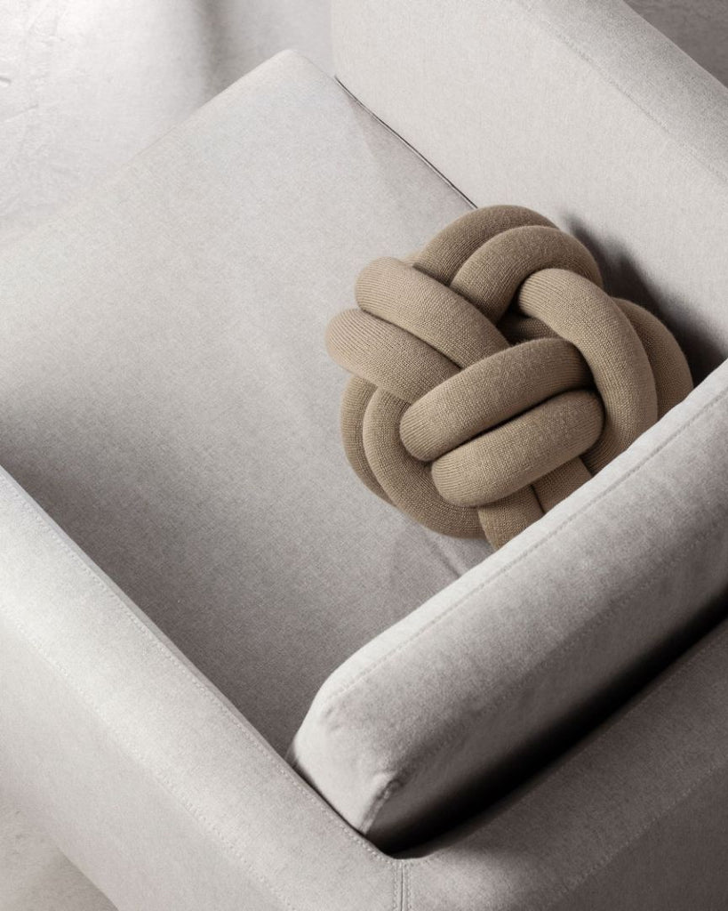 A cushion with a unique character, based on sculptural form instead of patterns. Knot is made from a knitted tube, several meters in length, which is then tied up to create a compact knot which is as comfortable as a support in the sofa as it is elegant to behold. Thanks to its strong design, Ragnheiður Ösp Sigurðardóttir’s Knot cushion belongs to the exclusive group of products that remain in one’s memory. 