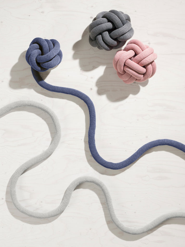 A cushion with a unique character, based on sculptural form instead of patterns. Knot is made from a knitted tube, several meters in length, which is then tied up to create a compact knot which is as comfortable as a support in the sofa as it is elegant to behold. Thanks to its strong design, Ragnheiður Ösp Sigurðardóttir’s Knot cushion belongs to the exclusive group of products that remain in one’s memory. 
