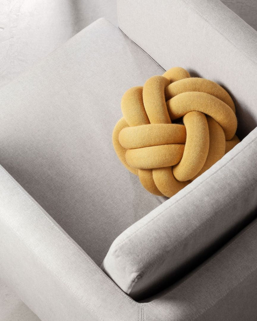 A cushion with a unique character, based on sculptural form instead of patterns. Knot is made from a knitted tube, several meters in length, which is then tied up to create a compact knot which is as comfortable as a support in the sofa as it is elegant to behold. Thanks to its strong design, Ragnheiður Ösp Sigurðardóttir’s Knot cushion belongs to the exclusive group of products that remain in one’s memory. 