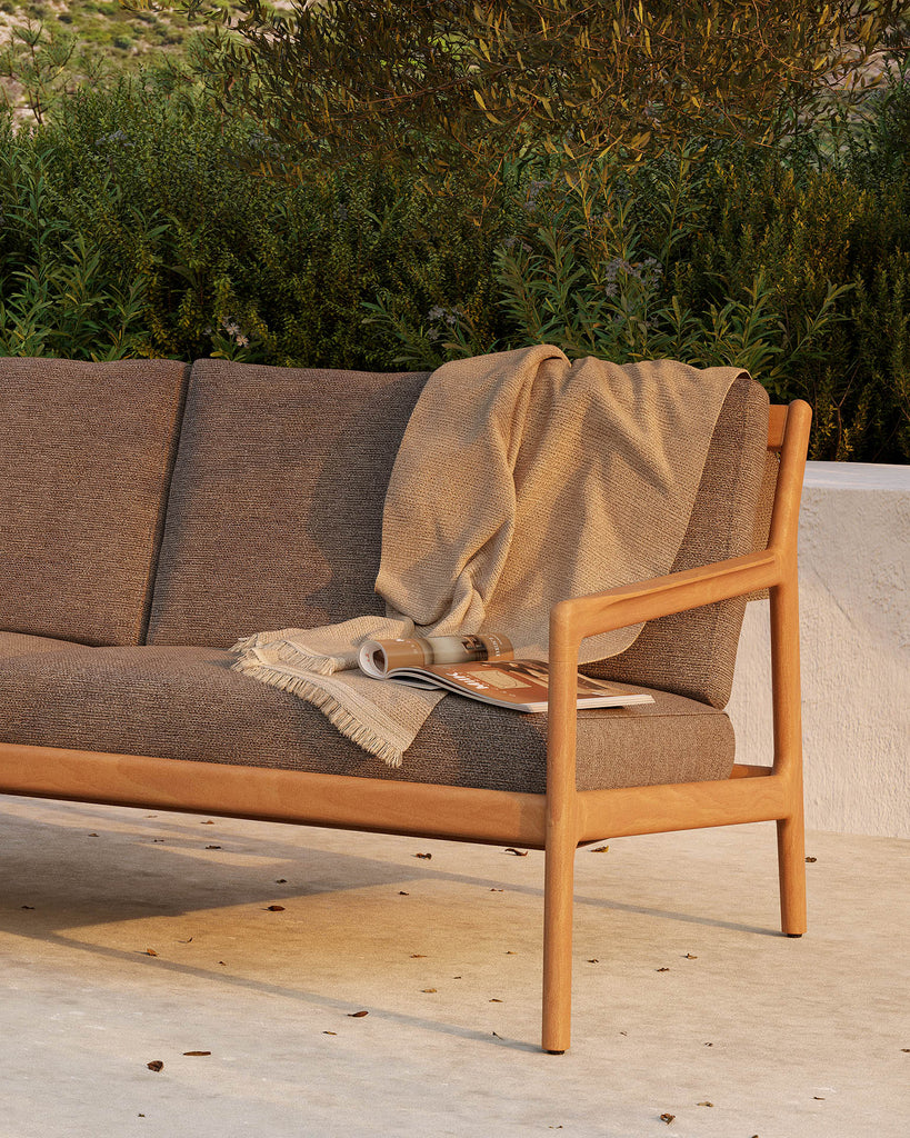 Beautiful from every angle, luxuriant shapes and curves form the basis of the Jack sofa collection from Ethnicraft. Featuring upholstery woven in Belgium, every detail has been meticulously crafted to ensure comfort and elegance when enjoying the outdoors. Apart of Ethnicraft's first outdoor collection. Designed by Jacques Deneef.