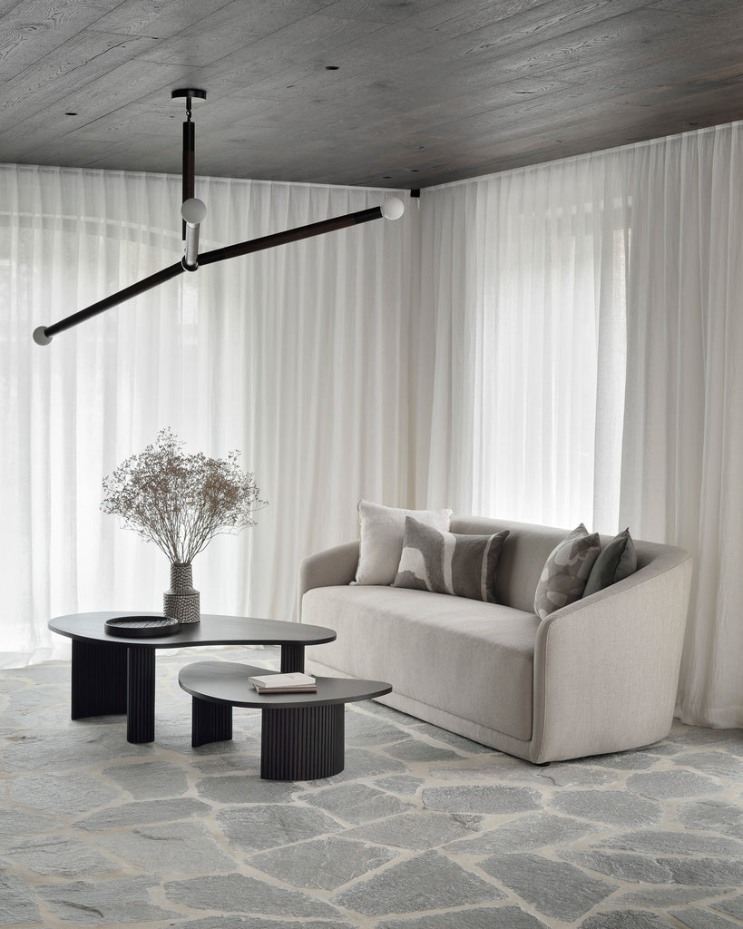 The Trapeze Three Seater Sofa by Jacques Deneef for Ethnicraft. Geometric, straight and clean lines: Trapeze is a statement of classic minimalism. Accumulate cushions to style it as you wish, like a blank canvas on which you can let your inspiration flow. This nonchalant lounge sofa will fit into any style, whether that be in an urban flat or a country homestead.