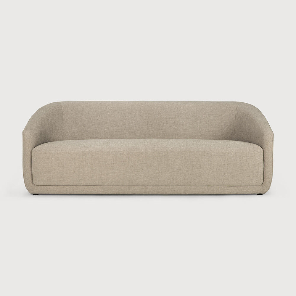 The Trapeze Three Seater Sofa by Jacques Deneef for Ethnicraft. Geometric, straight and clean lines: Trapeze is a statement of classic minimalism. Accumulate cushions to style it as you wish, like a blank canvas on which you can let your inspiration flow. This nonchalant lounge sofa will fit into any style, whether that be in an urban flat or a country homestead. 